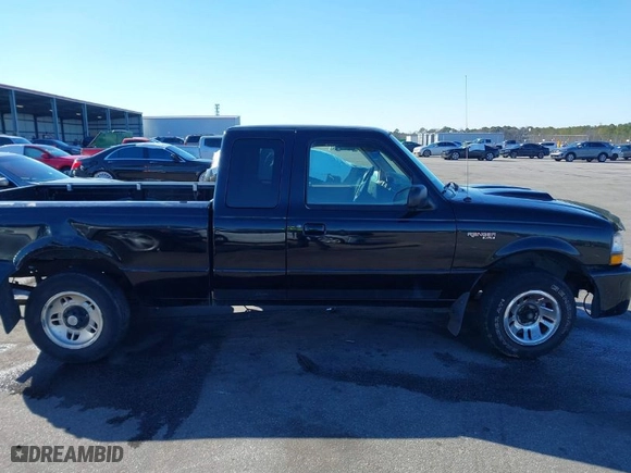 1999 Ford Ranger XL with VIN 1FTYR14X6XTA83979, listed as a IAAI auction lot 41355593 with 201,284 mi miles. Bid and sale history available at carsss.com. Image 13.