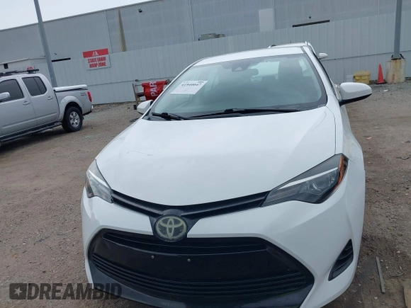 2019 Toyota Corolla L with VIN 5YFBURHE1KP930676, listed as a IAAI auction lot 41940047 with 82,885 mi miles. Bid and sale history available at carsss.com. Image 12.