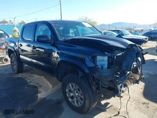 2017 Toyota Tacoma SR with VIN 5TFAX5GN5HX095074, listed as a IAAI auction lot 41814654 with 120,782 mi miles. Bid and sale history available at carsss.com. Image 1.