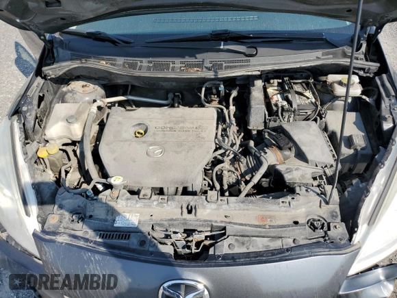 2013 Mazda 5 Touring with VIN JM1CW2CL5D0152715, listed as a Copart auction lot 71315534 with 219,315 mi miles and Salvage Title. Bid and sale history available at DreamBid. Image 11.