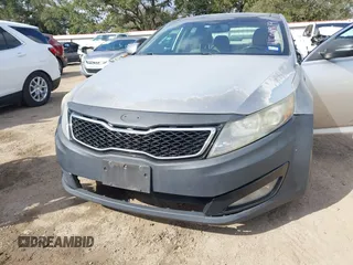 2012 Kia Optima EX with VIN 5XXGN4A6XCG071476, listed as a IAAI auction lot 41508819 with 176,487 mi miles and . Bid and sale history available at carsss.com. Image 6.