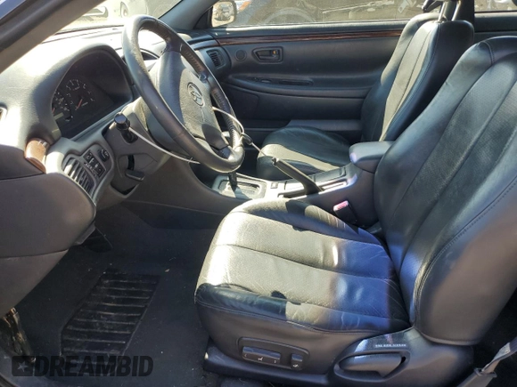 2000 Toyota Solara SE z VIN 2T1CF28P8YC296590, wystawiony jako Copart lot #49839935 z przebiegiem 192 140 mil mil oraz Czysty tytuł • Clean title. Historia ofert i sprzedaży dostępna na DreamBid. Obrazek 7.