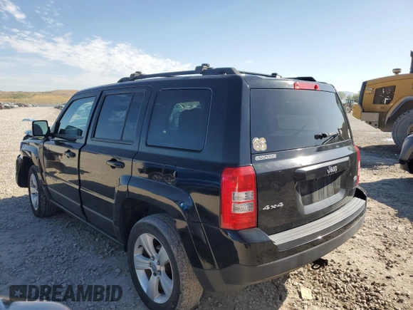 2014 Jeep Patriot Latitude with VIN 1C4NJRFB5ED855888, listed as a Copart auction lot 57969355 with 113,196 mi miles and Salvage title. Bid and sale history available at DreamBid. Image 2.