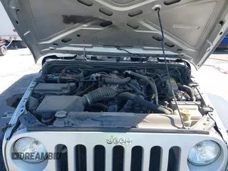 2010 Jeep Wrangler Unlimited Sport with VIN 1J4BA3H17AL211887, listed as a IAAI auction lot 41778324 with 185,626 mi miles. Bid and sale history available at carsss.com. Image 10.