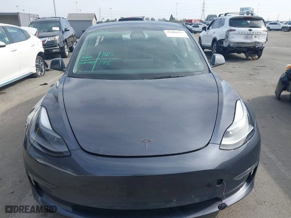 2023 Tesla Model 3 with VIN 5YJ3E1EA0PF577869, listed as a IAAI auction lot 41468956 with 38,760 mi miles. Bid and sale history available at carsss.com. Image 12.