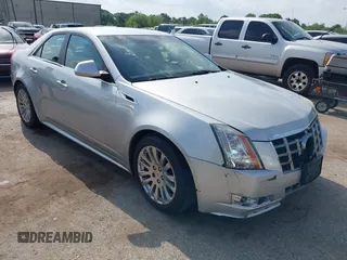 2012 Cadillac CTS Performance z VIN 1G6DJ5E37C0145221, wystawiony jako IAAI lot #42111935 z przebiegiem 82 103 mil mil oraz . Historia ofert i sprzedaży dostępna na DreamBid. Obrazek 1.