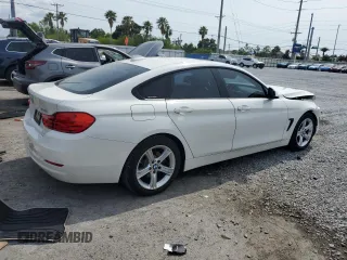 2015 BMW 4 Series 428i with VIN WBA4A9C59FGL85999, listed as a Copart auction lot 56275455 with 105,961 mi miles and Salvage title. Bid and sale history available at DreamBid. Image 3.