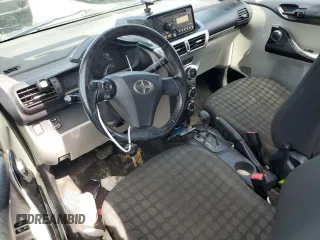 2012 Scion iQ z VIN JTNJJXB05CJ012193, wystawiony jako Copart lot #52180495 z przebiegiem Nie podano mil oraz Szkoda całkowita • Salvage title. Historia ofert i sprzedaży dostępna na DreamBid. Obrazek 8.