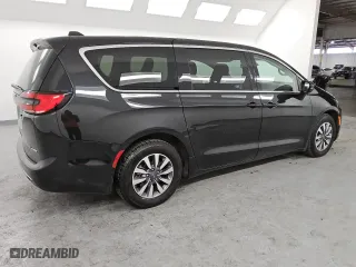 2023 Chrysler Pacifica Hybrid Touring L with VIN 2C4RC1L70PR631392, listed as a Copart auction lot 47396985 with 73,157 mi miles and Clean Title. Bid and sale history available at carsss.com. Image 3.