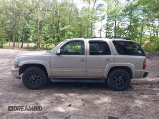 2005 Chevrolet Tahoe LS z VIN 1GNEK13T45J167997, wystawiony jako IAAI lot #42298160 z przebiegiem 142 981 mil mil oraz . Historia ofert i sprzedaży dostępna na DreamBid. Obrazek 14.