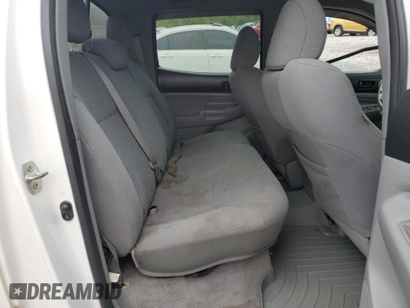 2011 Toyota Tacoma PreRunner with VIN 3TMJU4GN5BM113539, listed as a Copart auction lot 52208635 with 304,559 mi miles and Salvage Title. Bid and sale history available at DreamBid. Image 11.