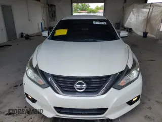 2016 Nissan Altima SR z VIN 1N4AL3AP7GC199555, wystawiony jako Copart lot #57250315 z przebiegiem 210 826 mil mil oraz Szkoda całkowita • Salvage title. Historia ofert i sprzedaży dostępna na DreamBid. Obrazek 5.