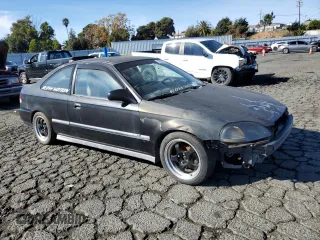 1996 Honda Civic DX with VIN 1HGEJ6126TL006590, listed as a Copart auction lot 79457604 with 186,293 mi miles and Salvage Title. Bid and sale history available at carsss.com. Image 4.