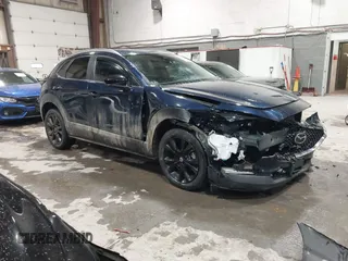 2024 Mazda CX-30 S Select Sport z VIN 3MVDMBBM9RM664131, wystawiony jako IAAI lot #41569500 z przebiegiem 16 520 mil mil oraz . Historia ofert i sprzedaży dostępna na DreamBid. Obrazek 1.