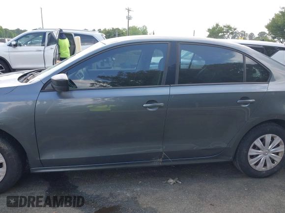 2013 Volkswagen Jetta S with VIN 3VW1K7AJ9DM261013, listed as a IAAI auction lot 42268412 with 131,486 mi miles and . Bid and sale history available at DreamBid. Image 14.