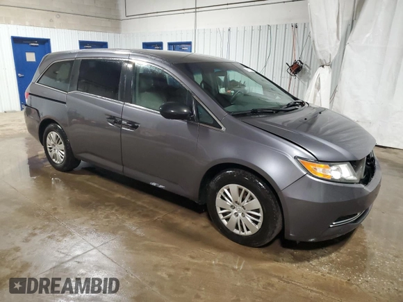 2015 Honda Odyssey LX with VIN 5FNRL5H25FB031580, listed as a Copart auction lot 48119255 with 143,552 mi miles and Salvage Title. Bid and sale history available at DreamBid. Image 4.