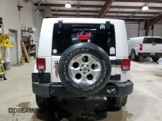 2008 Jeep Wrangler Unlimited Sahara с VIN 1J8GA59108L514034, выставлен на аукционе Copart как лот 58812215 с пробегом 191 800 миль миль и Списание • Salvage title. История ставок и продаж доступна на DreamBid. Изображение 6.