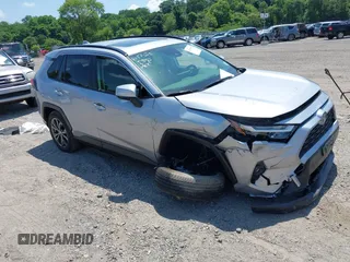 2022 Toyota RAV4 Hybrid XLE Premium with VIN JTMB6RFV1ND063963, listed as a IAAI auction lot 42550907 with 35,012 mi miles and . Bid and sale history available at DreamBid. Image 1.