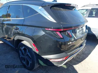 2022 Hyundai Tucson Limited with VIN 5NMJE3AEXNH001018, listed as a IAAI auction lot 41243221 with 81,590 mi miles. Bid and sale history available at carsss.com. Image 3.