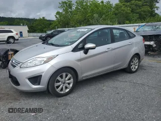 2013 Ford Fiesta SE z VIN 3FADP4BJ9DM108667, wystawiony jako Copart lot #58542295 z przebiegiem 94 812 mil mil oraz Szkoda całkowita • Salvage title. Historia ofert i sprzedaży dostępna na DreamBid. Obrazek 1.