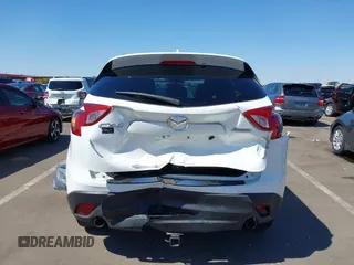 2015 Mazda CX-5 Grand Touring with VIN JM3KE2DYXF0493370, listed as a IAAI auction lot 42087156 with 161,464 mi miles. Bid and sale history available at carsss.com. Image 6.