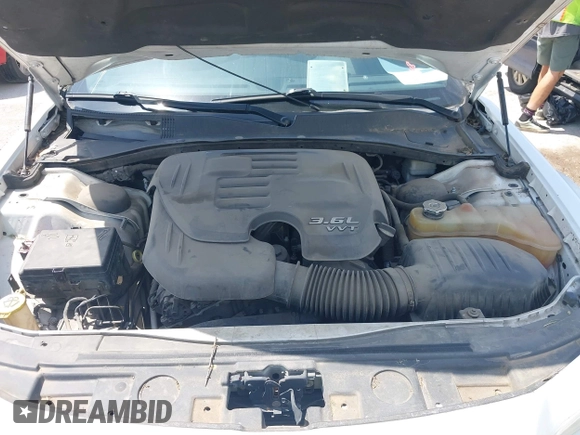 2013 Chrysler 300 with VIN 2C3CCAAG9DH588198, listed as a IAAI auction lot 42556294 with 171,765 mi miles and . Bid and sale history available at DreamBid. Image 10.