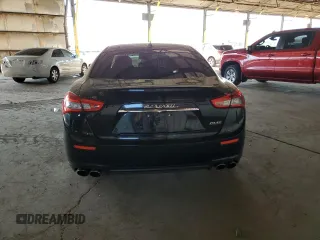2015 Maserati Ghibli z VIN ZAM57XSA2F1146396, wystawiony jako Copart lot #56568585 z przebiegiem 85 556 mil mil oraz Szkoda całkowita • Salvage title. Historia ofert i sprzedaży dostępna na DreamBid. Obrazek 6.