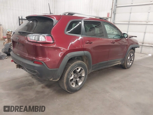 2019 Jeep Cherokee Trailhawk with VIN 1C4PJMBX7KD200267, listed as a IAAI auction lot 42216422 with Not provided miles and . Bid and sale history available at DreamBid. Image 4.