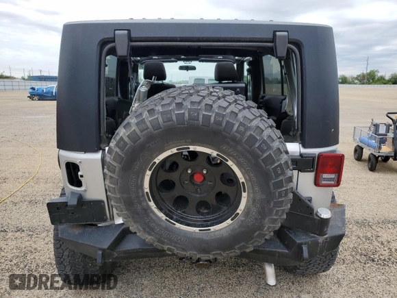 2011 Jeep Wrangler Unlimited Rubicon with VIN 1J4BA6H13BL537964, listed as a Copart auction lot 57532725 with 71,498 mi miles and Salvage title. Bid and sale history available at DreamBid. Image 6.