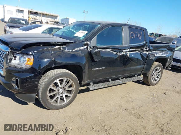 2021 GMC Canyon 4WD Denali z VIN 1GTG6EEN9M1240596, wystawiony jako IAAI lot #40760124 z przebiegiem 52 985 mil mil oraz . Historia ofert i sprzedaży dostępna na DreamBid. Obrazek 21.