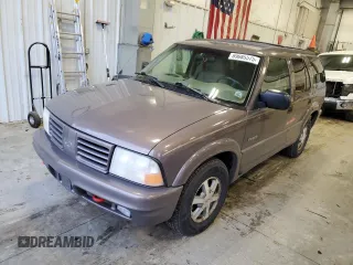 1999 Oldsmobile Bravada z VIN 1GHDT13W5X2717212, wystawiony jako Copart lot #89085575 z przebiegiem 246 366 mil mil oraz Tytuł czysty. Historia ofert i sprzedaży dostępna na DreamBid. Obrazek 1.