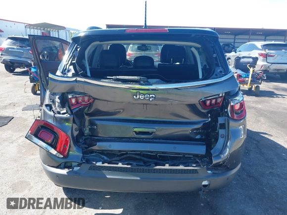 2018 Jeep Compass Limited with VIN 3C4NJDCB8JT284845, listed as a IAAI auction lot 42049290 with 59,210 mi miles and . Bid and sale history available at carsss.com. Image 16.