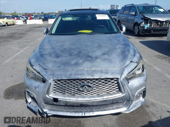 2015 Infiniti Q50 z VIN JN1BV7AP0FM332023, wystawiony jako IAAI lot #41960006 z przebiegiem 173 540 mil mil oraz . Historia ofert i sprzedaży dostępna na DreamBid. Obrazek 11.