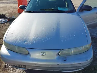2004 Oldsmobile Alero GL1 z VIN 1G3NL52E94C189058, wystawiony jako IAAI lot #41224615 z przebiegiem 208 921 mil mil oraz . Historia ofert i sprzedaży dostępna na DreamBid. Obrazek 10.