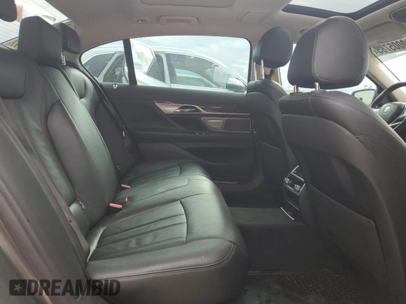 2019 BMW 7 Series 740i z VIN WBA7E2C50KB454532, wystawiony jako Copart lot #89005785 z przebiegiem 93 921 mil mil oraz Czysty tytuł • Clean title. Historia ofert i sprzedaży dostępna na DreamBid. Obrazek 10.