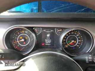 2021 Jeep Wrangler Sport S with VIN 1C4GJXAG2MW762104, listed as a Copart auction lot 46620845 with 56,799 mi miles and Salvage Title. Bid and sale history available at DreamBid. Image 9.