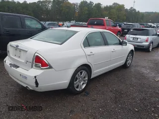 2009 Ford Fusion SEL with VIN 3FAHP08199R103707, listed as a IAAI auction lot 40882108 with 239,154 mi miles and . Bid and sale history available at carsss.com. Image 4.