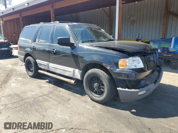 2003 Ford Expedition Special Service with VIN 1FMFU16L83LC58206, listed as a Copart auction lot 57591205 with 184,133 mi miles and Salvage title. Bid and sale history available at DreamBid. Image 4.
