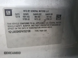 2015 Chevrolet Sonic LS with VIN 1G1JA5SH6F4152196, listed as a Copart auction lot 59096455 with 128,113 mi miles and Salvage title. Bid and sale history available at DreamBid. Image 12.