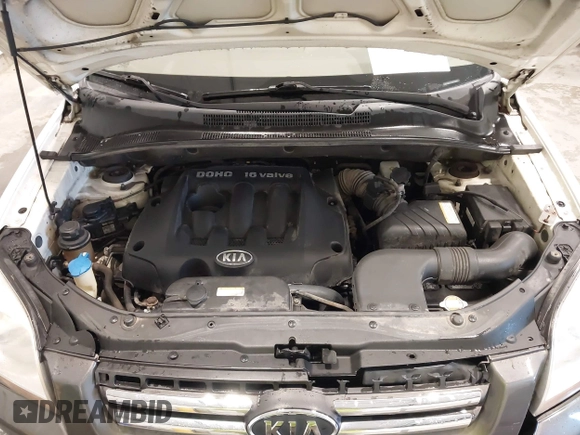 2007 Kia Sportage LX with VIN KNDJF724877399530, listed as a IAAI auction lot 41696698 with 124,967 mi miles. Bid and sale history available at carsss.com. Image 10.