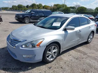 2013 Nissan Altima 2.5 SL with VIN 1N4AL3AP0DC143100, listed as a IAAI auction lot 41998585 with 102,564 mi miles. Bid and sale history available at carsss.com. Image 2.