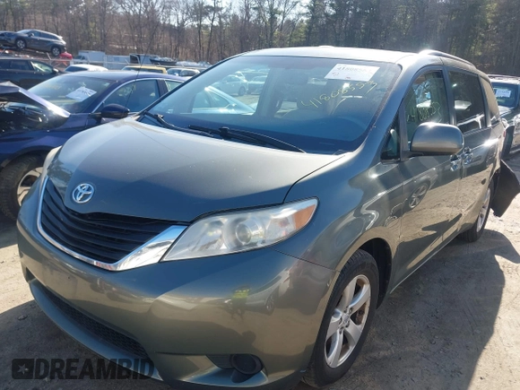 2011 Toyota Sienna LE AAS with VIN 5TDKK3DC0BS052186, listed as a IAAI auction lot 41808553 with 131,321 mi miles. Bid and sale history available at carsss.com. Image 2.