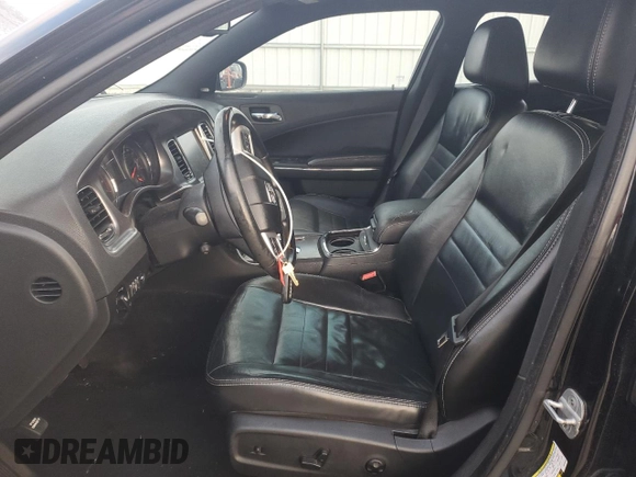 2012 Dodge Charger SXT with VIN 2C3CDXJG1CH240409, listed as a Copart auction lot 81831584 with 185,527 mi miles and Clean Title. Bid and sale history available at carsss.com. Image 7.