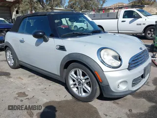 2011 MINI Convertible with VIN WMWZN3C57BT133094, listed as a IAAI auction lot 41711094 with 96,056 mi miles and . Bid and sale history available at DreamBid. Image 1.