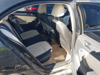 2012 Volkswagen Jetta Sedan SEL w/Sunroof with VIN 3VWLX7AJ1CM376990, listed as a IAAI auction lot 41206594 with 50,906 mi miles. Bid and sale history available at carsss.com. Image 8.