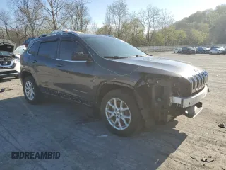 2015 Jeep Cherokee Latitude with VIN 1C4PJMCB6FW541625, listed as a Copart auction lot 54527515 with 120,997 mi miles and Salvage Title. Bid and sale history available at carsss.com. Image 4.