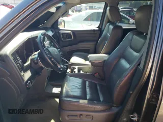 2011 Honda Ridgeline RTL with VIN 5FPYK1F51BB007802, listed as a Copart auction lot 63261935 with 397,803 mi miles and Clean title. Bid and sale history available at DreamBid. Image 7.