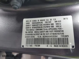 2015 Honda CR-V LX with VIN 3CZRM3H34FG707841, listed as a IAAI auction lot 41654996 with 133,894 mi miles. Bid and sale history available at carsss.com. Image 9.