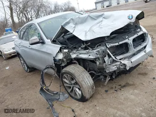 2018 BMW X6 xDrive35i with VIN 5UXKU2C50J0X49445, listed as a IAAI auction lot 41449077 with 130,912 mi miles. Bid and sale history available at carsss.com. Image 1.