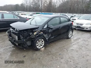 2012 Kia Rio EX with VIN KNADN5A39C6013756, listed as a IAAI auction lot 41560330 with 157,365 mi miles. Bid and sale history available at carsss.com. Image 2.
